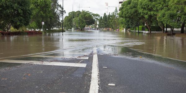 Flooded urban street demonstrating flood risk